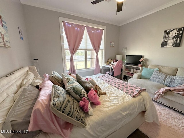 bedroom featuring a ceiling fan and crown molding