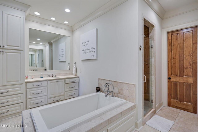 bathroom featuring tile patterned flooring, vanity, ornamental molding, and independent shower and bath