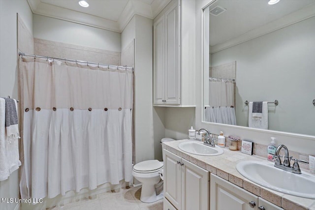 bathroom with tile patterned flooring, crown molding, toilet, vanity, and a shower with shower curtain