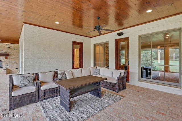 view of patio featuring ceiling fan and an outdoor living space