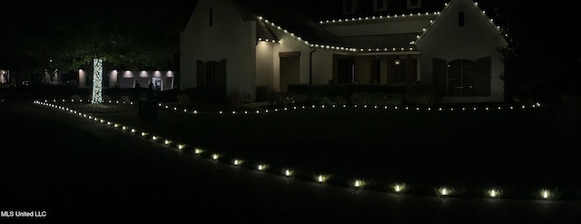 yard at twilight with a water view