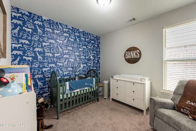 6750 Whooper Swan Dr, Olive Branch, MS 38654 - carpeted bedroom with a nursery area