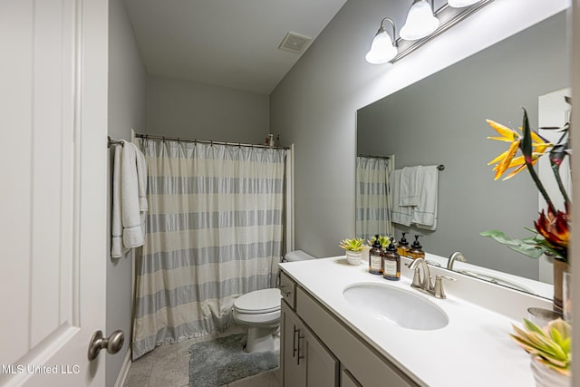 6750 Whooper Swan Dr, Olive Branch, MS 38654 - bathroom with vanity, toilet, a shower with shower curtain, and tile patterned flooring