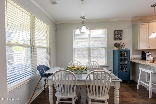 6750 Whooper Swan Dr, Olive Branch, MS 38654 - dining area featuring dark wood-style flooring, wine cooler, ornamental molding, and baseboards