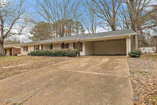 single story home featuring a carport