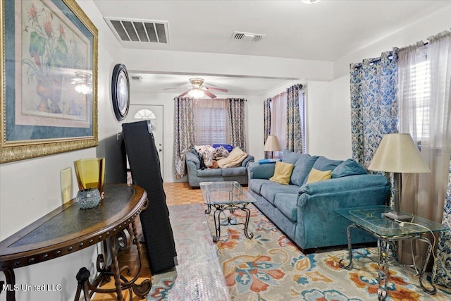 living room with ceiling fan