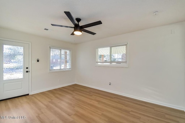 interior space featuring ceiling fan and light hardwood / wood-style floors