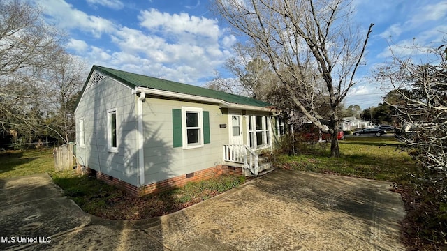 bungalow with a patio area