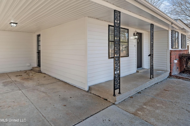 view of home's exterior featuring a carport