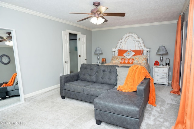 bedroom featuring carpet, crown molding, and baseboards