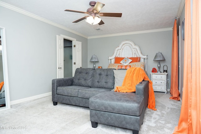 carpeted bedroom featuring visible vents, crown molding, a textured ceiling, and baseboards