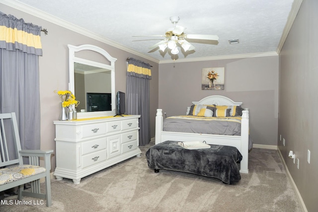 carpeted bedroom with baseboards, ceiling fan, visible vents, and crown molding