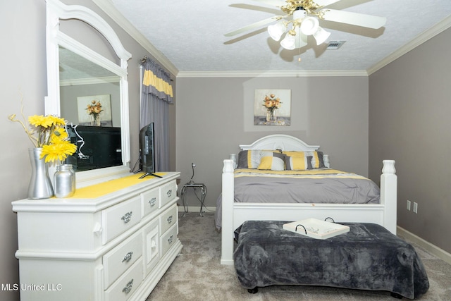 bedroom with a textured ceiling, light colored carpet, visible vents, baseboards, and crown molding