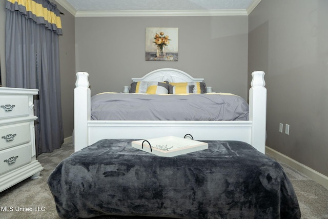 bedroom with baseboards, carpet, and crown molding