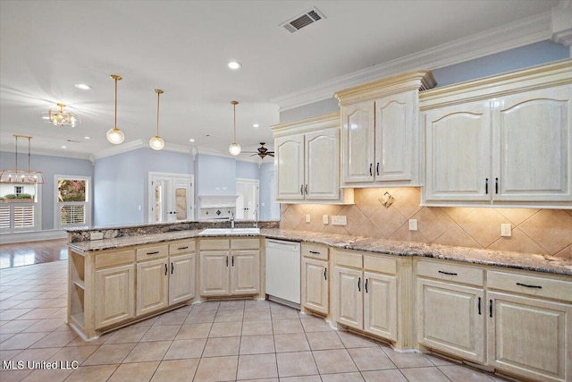 kitchen with decorative backsplash, ornamental molding, dishwasher, pendant lighting, and sink