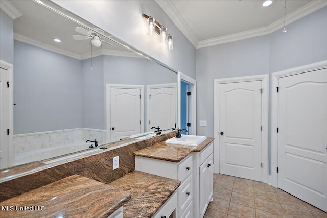 bathroom featuring vanity, ornamental molding, and tile patterned floors