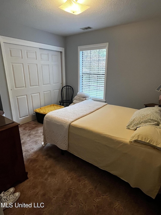 11423 High Rd, Hernando, MS 38632 - bedroom with a closet and dark colored carpet