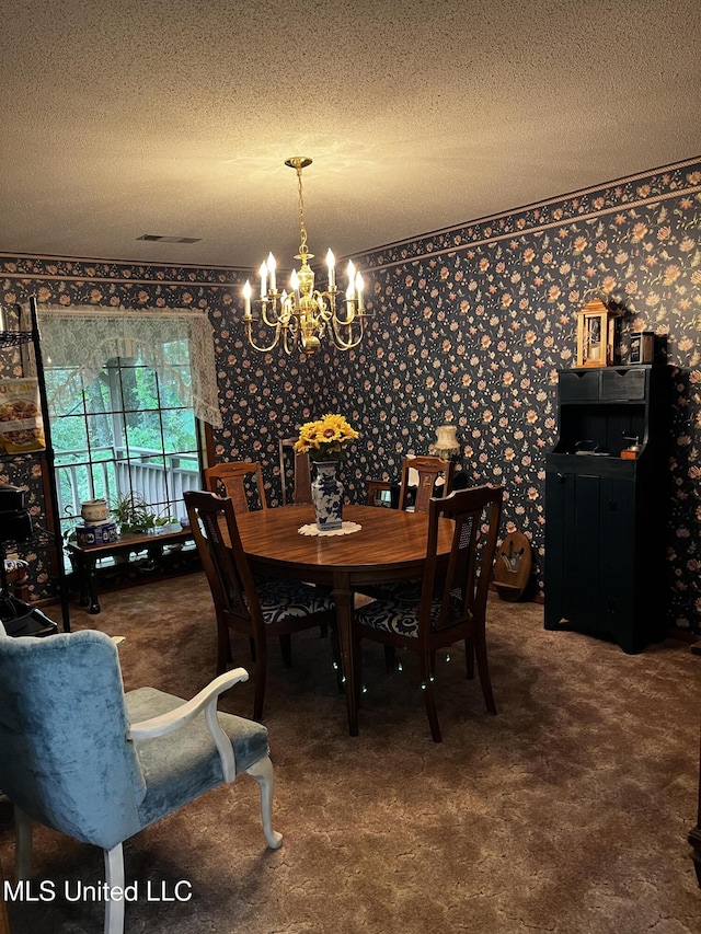 11423 High Rd, Hernando, MS 38632 - dining space with a chandelier, a textured ceiling, wallpapered walls, and carpet