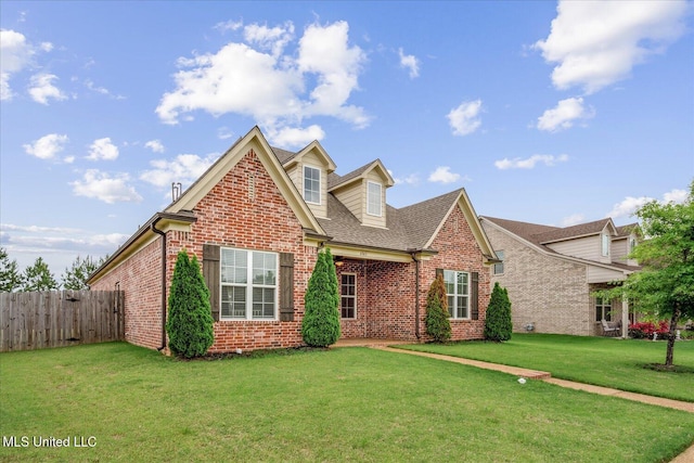 4943 W Margarette Cir, Olive Branch, MS 38654 - traditional-style home with brick siding and roof with shingles