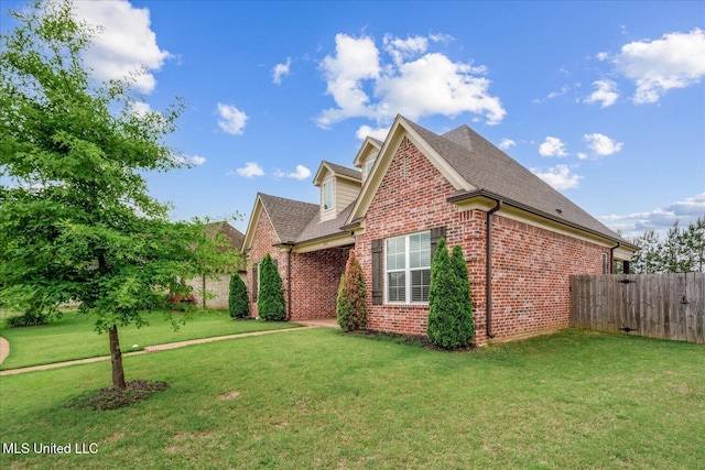 4943 W Margarette Cir, Olive Branch, MS 38654 - view of side of property with brick siding and a shingled roof