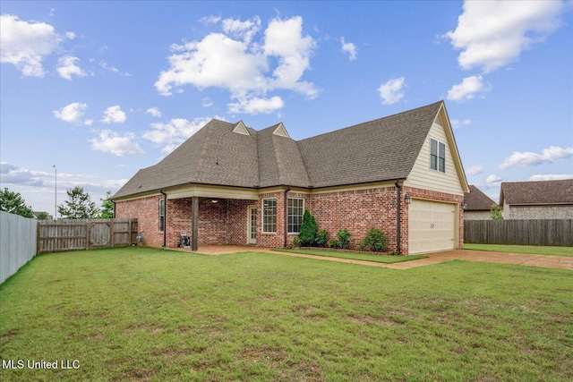 4943 W Margarette Cir, Olive Branch, MS 38654 - view of front of property featuring driveway, brick siding, a garage, and roof with shingles
