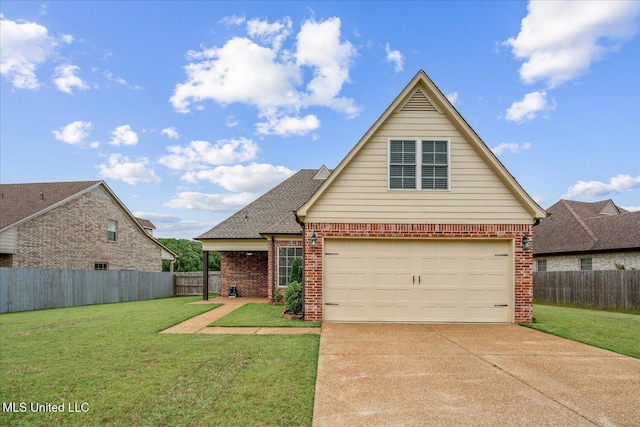 4943 W Margarette Cir, Olive Branch, MS 38654 - traditional home featuring brick siding, driveway, and roof with shingles
