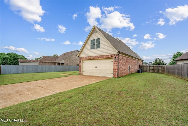 4943 W Margarette Cir, Olive Branch, MS 38654 - view of home's exterior featuring brick siding, driveway, central AC unit, and a garage