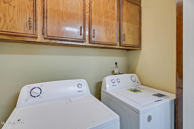 5530 Spencer Dr, Jackson, MS 39212 - washroom featuring washing machine and clothes dryer and cabinet space