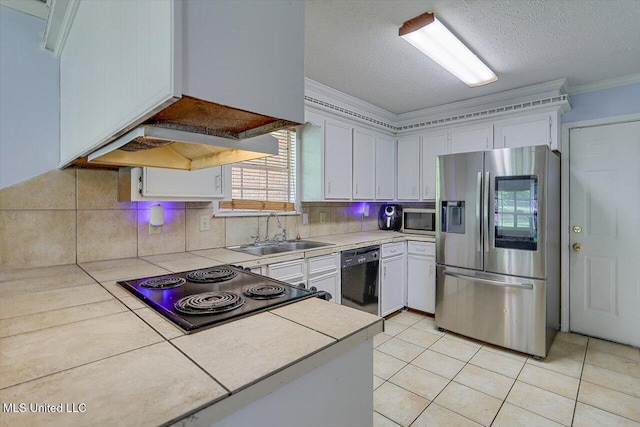 5530 Spencer Dr, Jackson, MS 39212 - kitchen with backsplash, crown molding, stainless steel appliances, range hood, and a sink