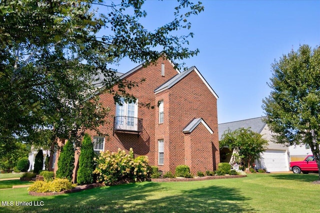 view of property exterior featuring a lawn, a balcony, and a garage