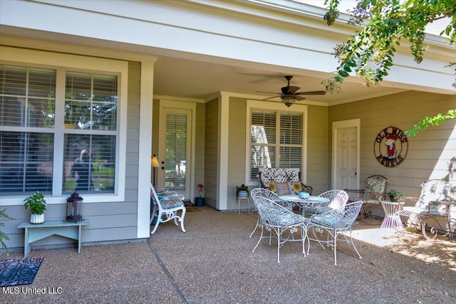 view of patio featuring ceiling fan