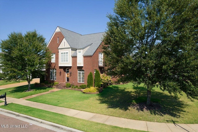 view of property featuring a front yard