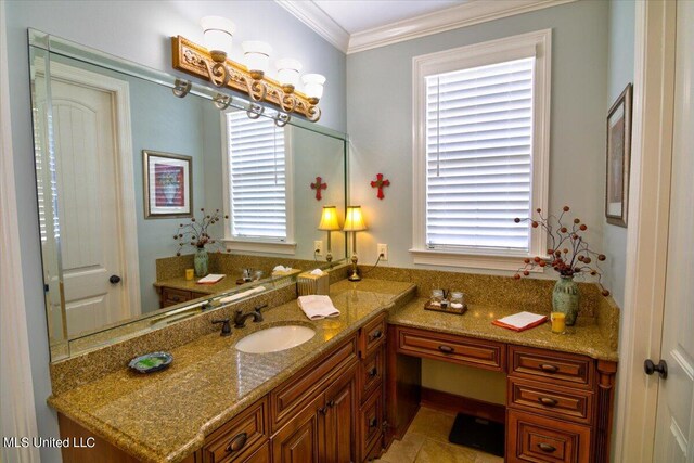 bathroom with vanity, ornamental molding, and tile patterned floors