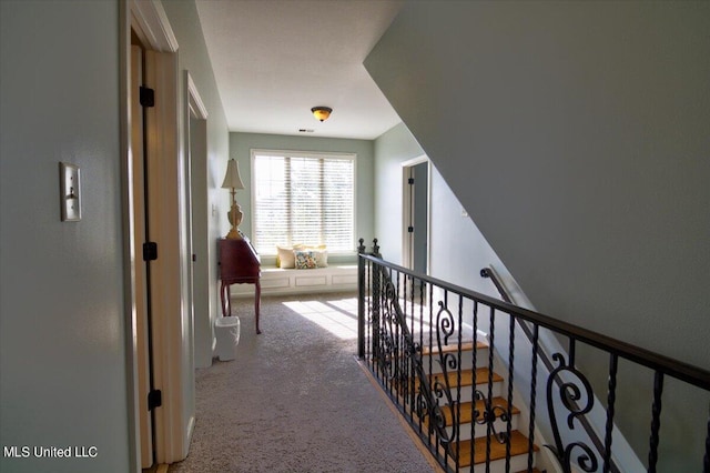 corridor with light carpet