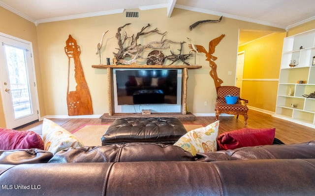 living room featuring crown molding, vaulted ceiling with beams, and hardwood / wood-style flooring