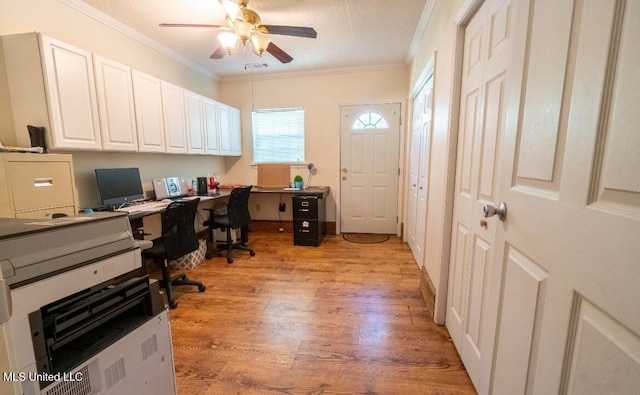 office with crown molding, a textured ceiling, light wood-type flooring, and ceiling fan