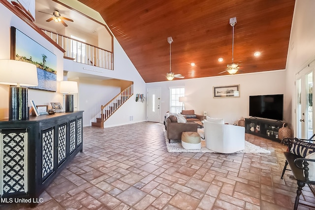 living room with high vaulted ceiling, stairway, wood ceiling, and a ceiling fan