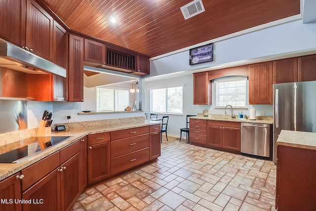 kitchen featuring visible vents, appliances with stainless steel finishes, brown cabinetry, wood ceiling, and a sink