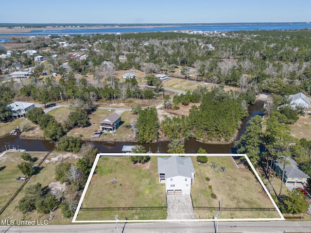 bird's eye view with a water view