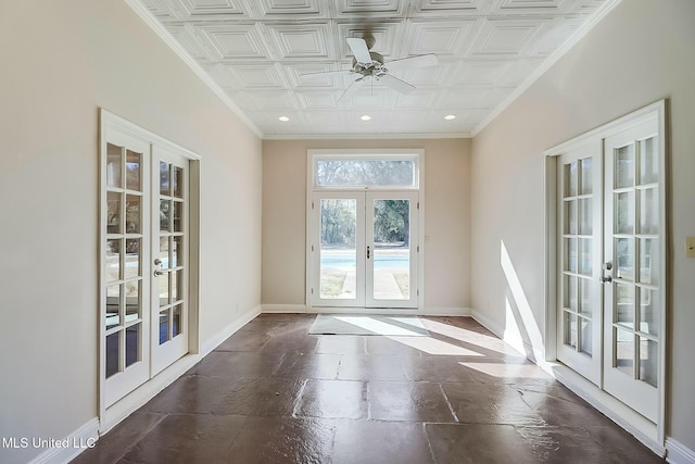 entryway featuring baseboards, an ornate ceiling, crown molding, french doors, and recessed lighting