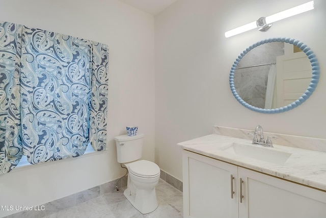 full bath with toilet, vanity, baseboards, marble finish floor, and shower / bath combo