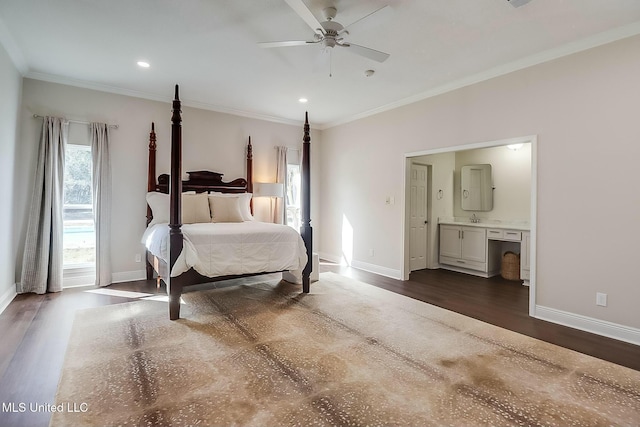 bedroom with ornamental molding, dark wood finished floors, and baseboards