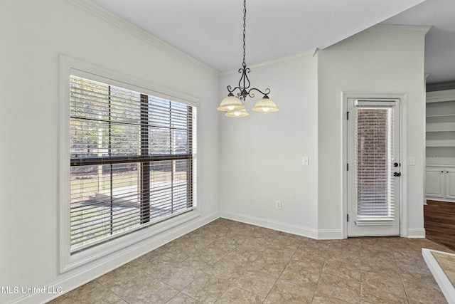 tiled spare room featuring ornamental molding and a chandelier