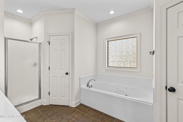 bathroom with crown molding and shower with separate bathtub