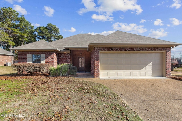 ranch-style house featuring a garage