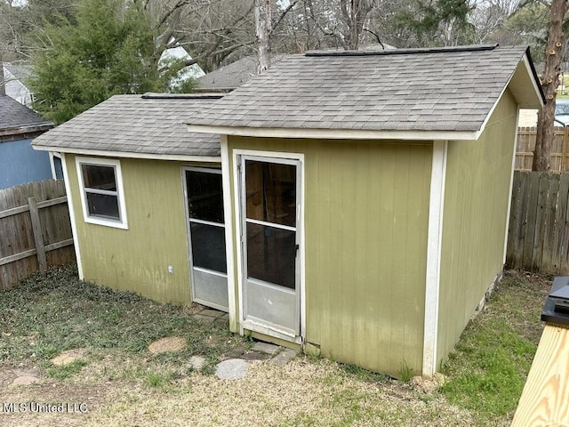 view of outdoor structure featuring an outdoor structure and fence