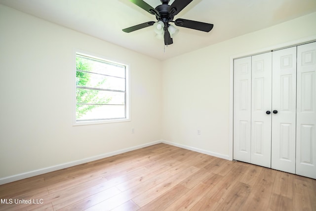 18 Crossgates Dr, Brandon, MS 39042 - unfurnished bedroom with baseboards, a closet, light wood-type flooring, and ceiling fan
