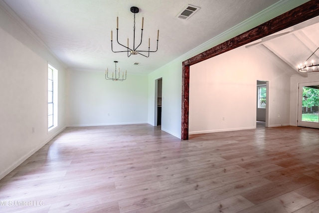 18 Crossgates Dr, Brandon, MS 39042 - spare room featuring a chandelier, wood finished floors, ornamental molding, and baseboards