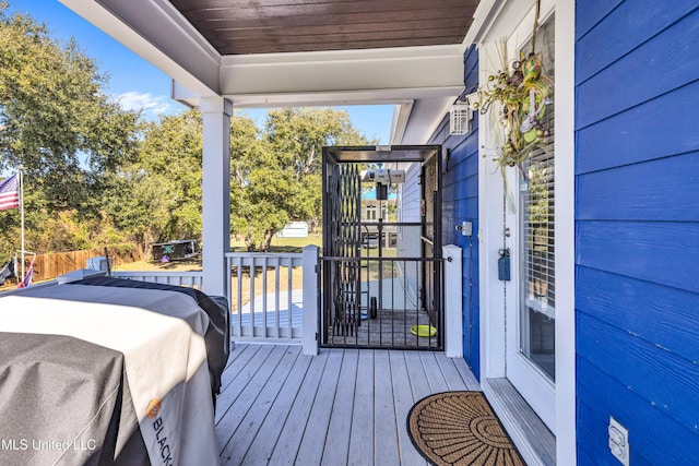 wooden deck featuring a porch