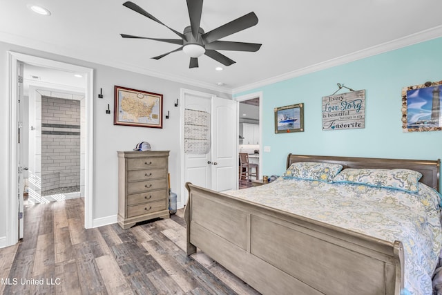 bedroom featuring ornamental molding, ensuite bathroom, hardwood / wood-style floors, and ceiling fan